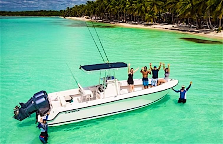 Private speedboat anchored in turquoise water